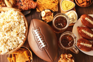 Table full of tasty snacks and beer