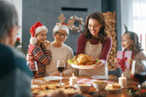 family celebrating Christmas dinner