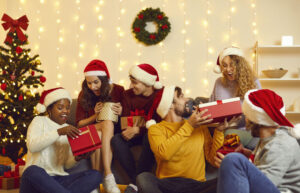 group of friends exchanging christmas presents