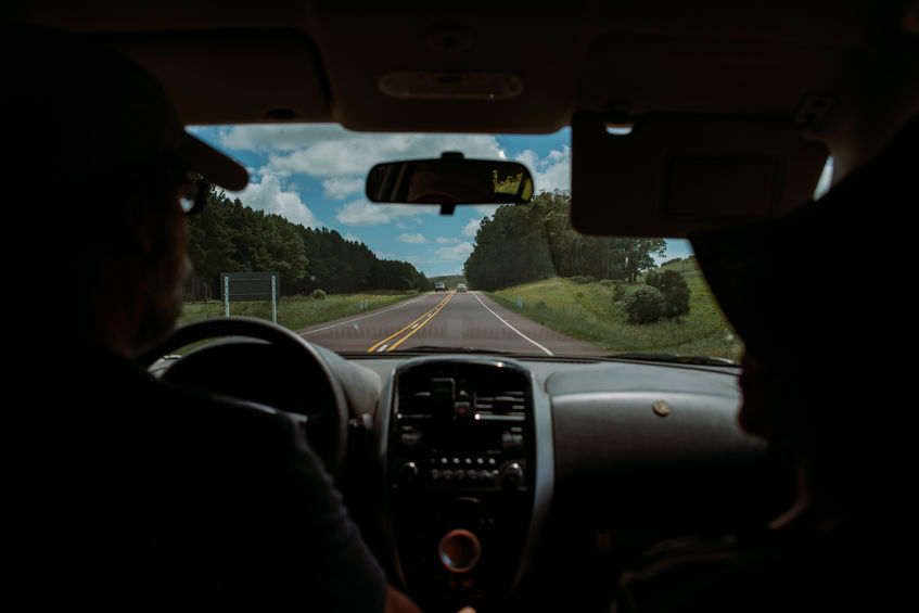 A view out of the front window of a vehicle