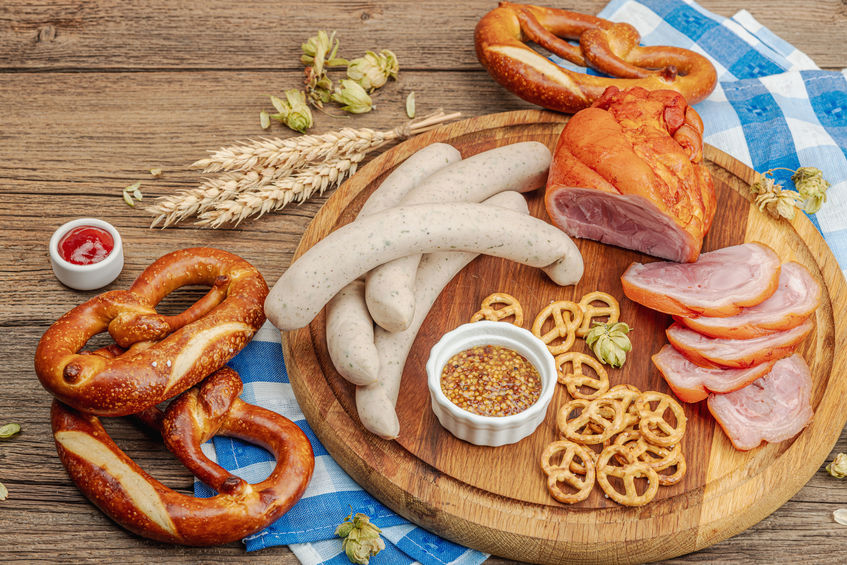 Charcuterie with pretzels, beer, sausages, and more